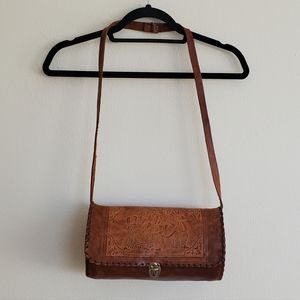 round leather shoulder bag